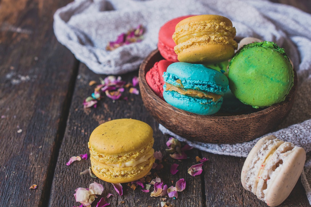 Colorful macaroon cookies on wooden background,selective focus